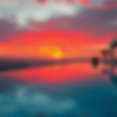 Serene infinity pool at sunset reflecting vibrant colors
