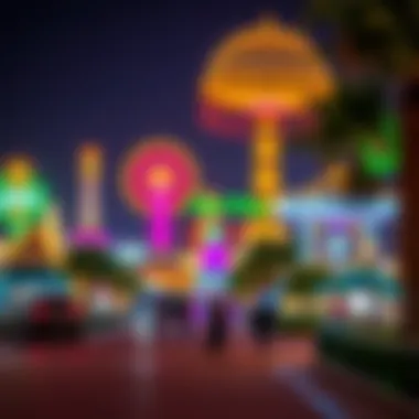 Night view of illuminated rides and attractions in Global Village