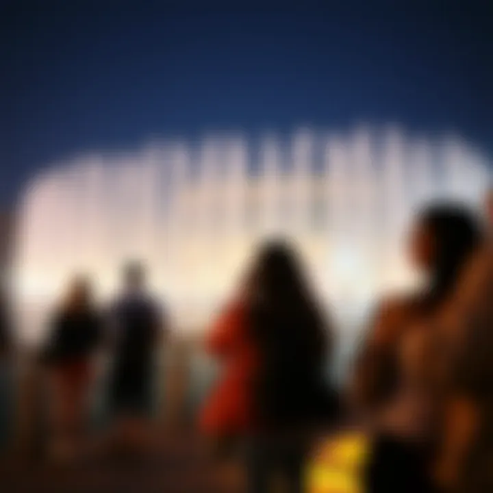 Tourists enjoying the Pointe Fountain's show