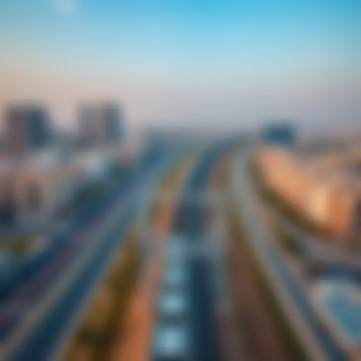 Aerial view of Dubai Metro tracks with surrounding real estate developments